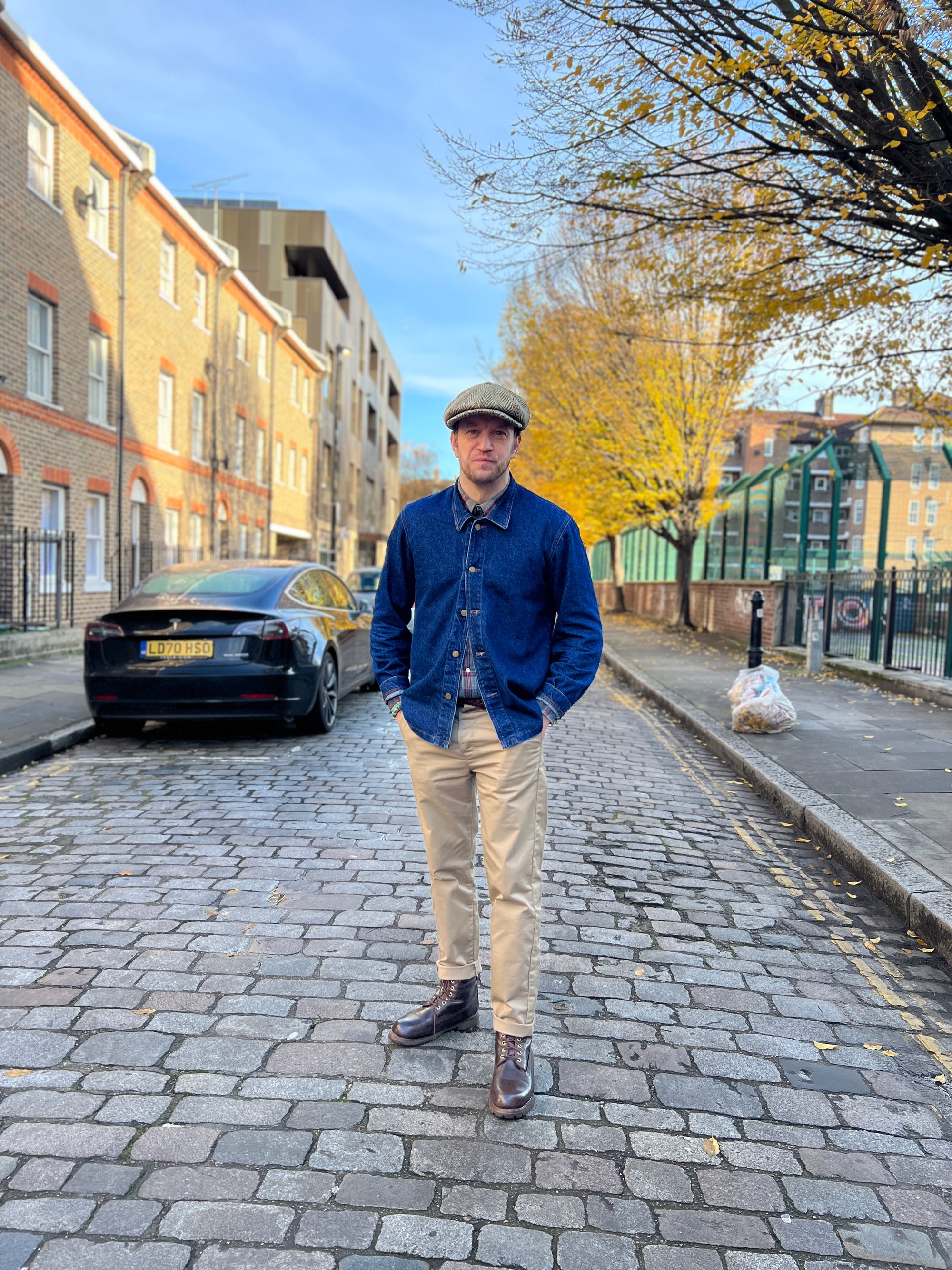 image of George Russo standing in a cobbled street