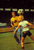 vintage image of Johan Cruyff wearing a yellow Lois Jeans t-shirt playing football with a boy