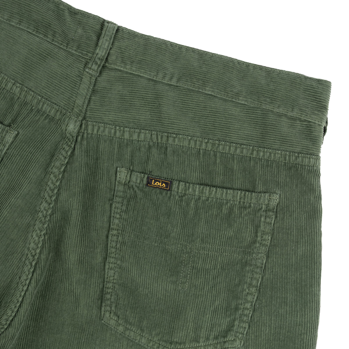 Close-up of the back waistband and right rear pocket of dried herb corduroy pants, showing a small black Lois brand tab on the pocket.