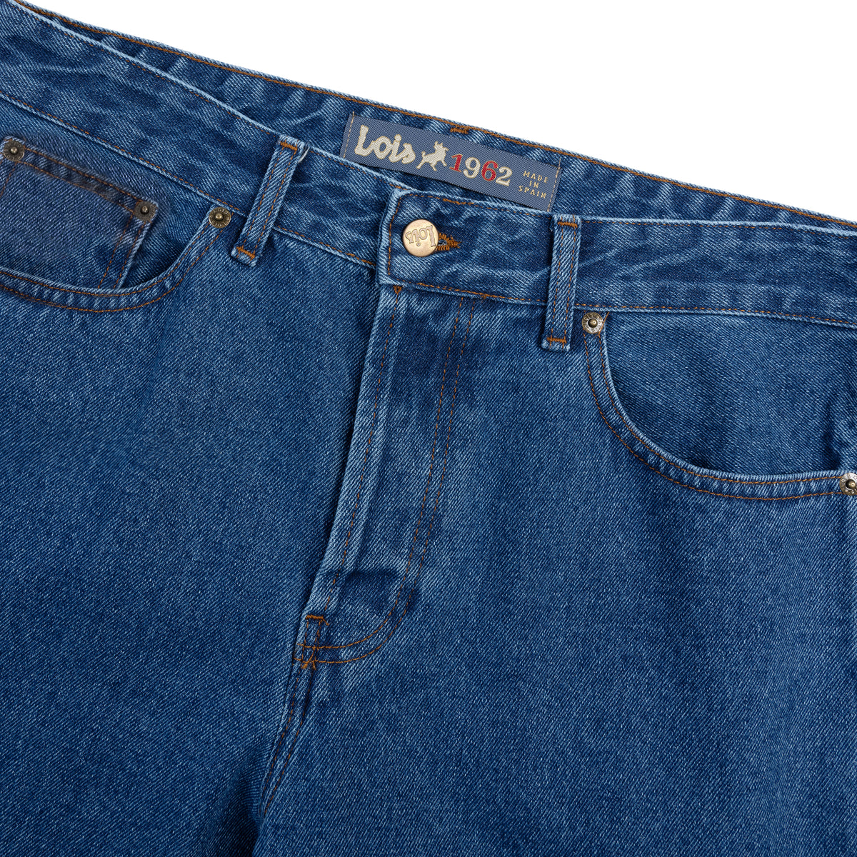 close up of front of jean with waist band and fly with Lois vintage logo