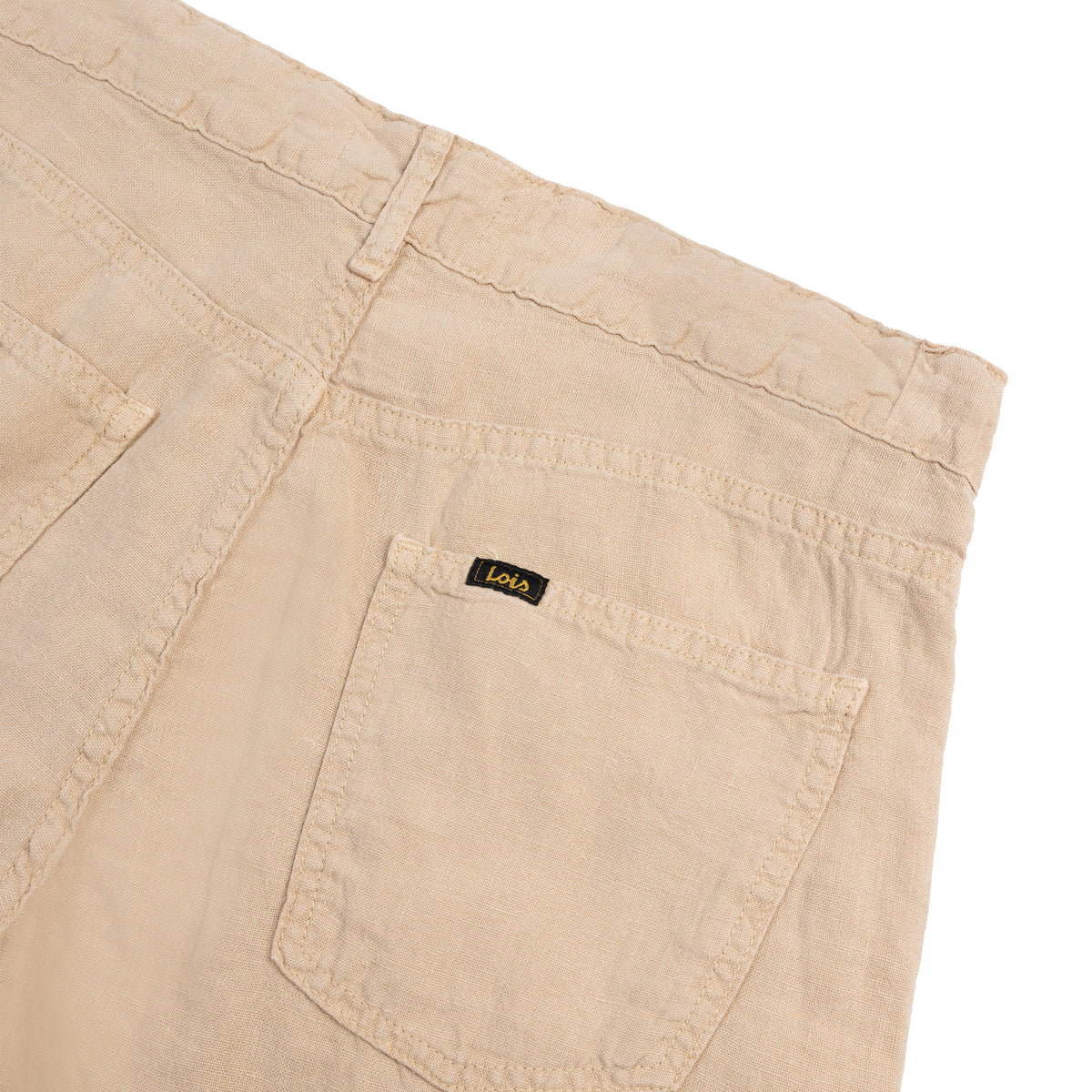 Beige pants with a visible brand logo on a white background