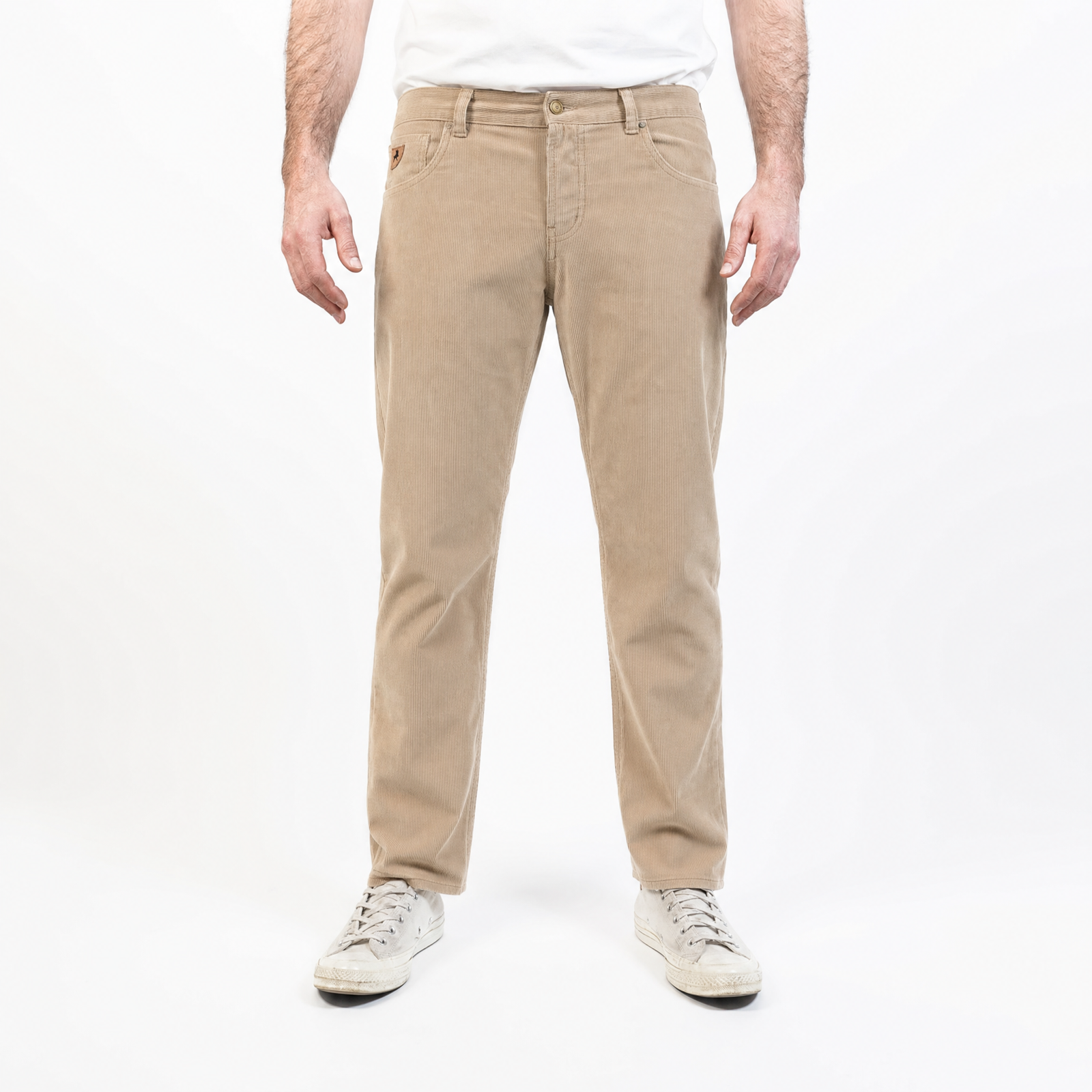 Person wearing beige pants on a white background